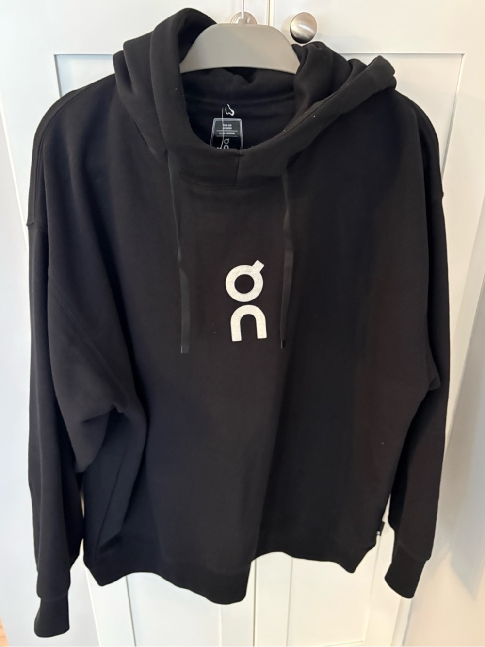 On Running Black Hoodie with White Logo large